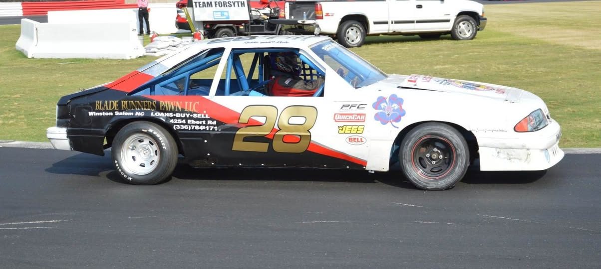 Side view of the #28 Stadium Stock car